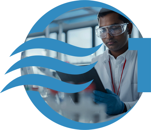 Chemist using a tablet in a lab