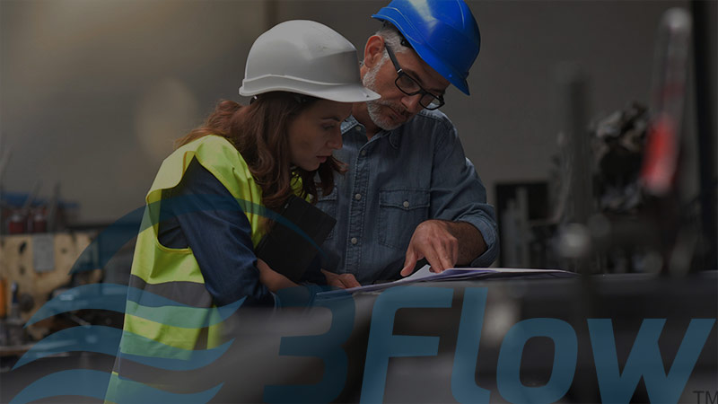 Man and woman wearing hard hats and looking at documents with dark overlay and 3Flow logo